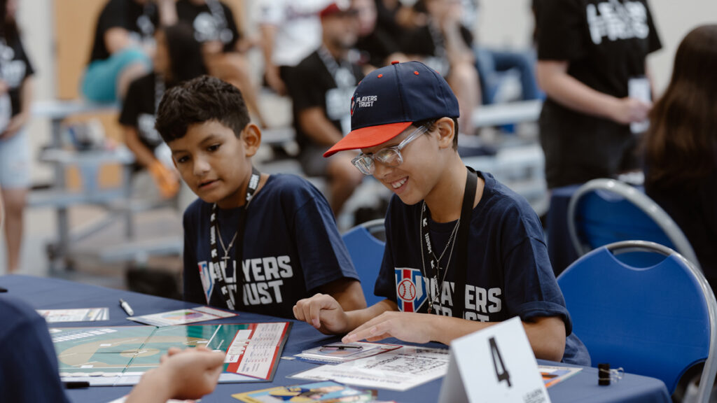 two students play Learn Fresh games