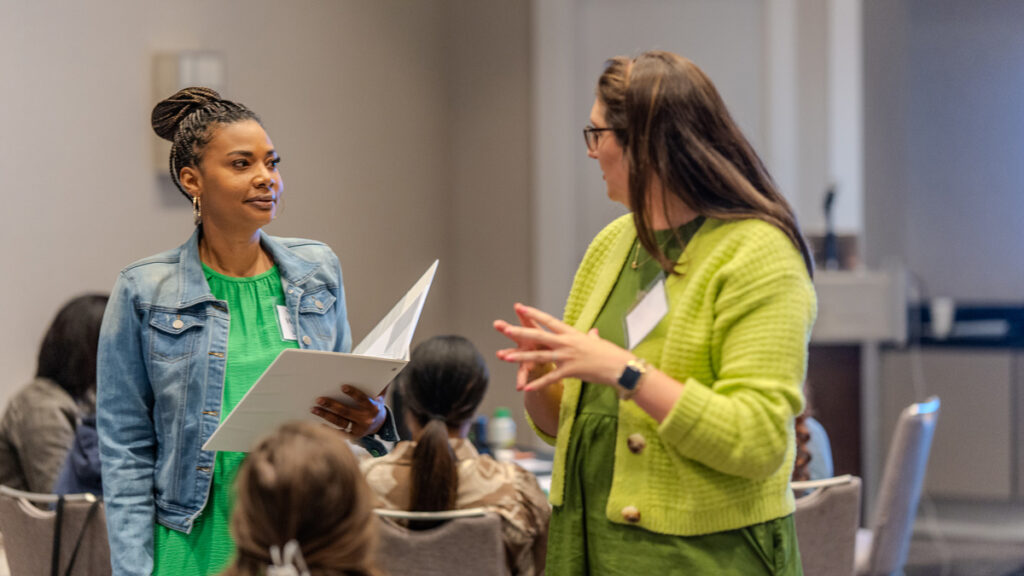 Two educators talking