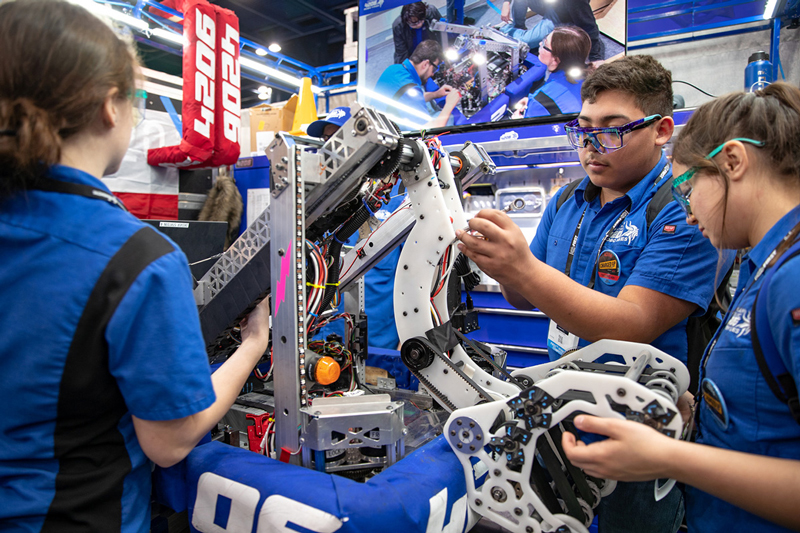 students work on robot