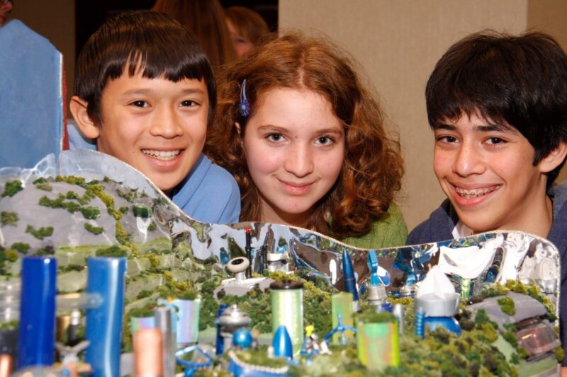 Future City children with a model city