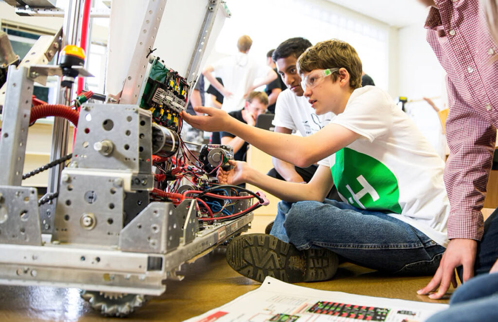 students work on robot