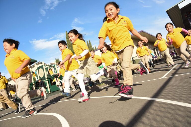 children run on the playground