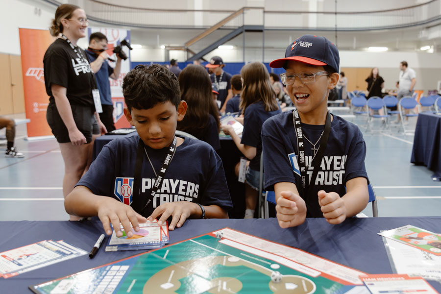 two young children play MLB Players Trust